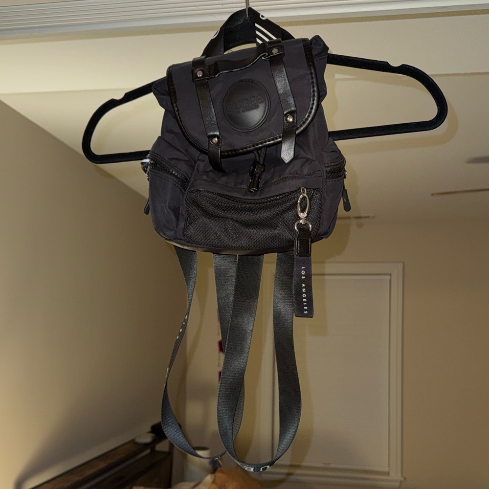 Guess Stylish Black Women’s Mini Backpack